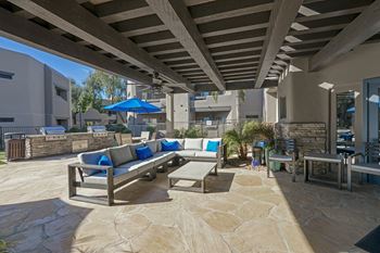 Outdoor grill with intimate seating area